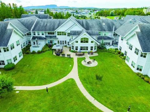 Aerial view of the residence, parking area and surrounding grounds