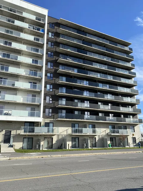 Residence balconies and the street-facing facade.