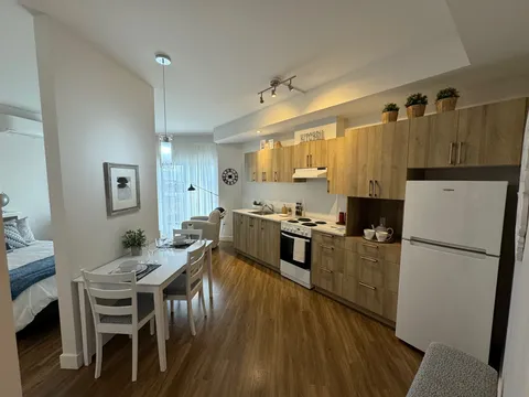 Apartment kitchenette and dining table.