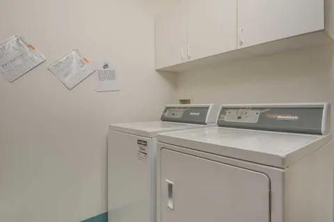 Laundry room with washing machine and dryer.
