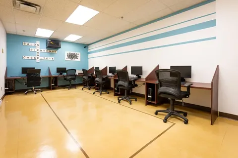 Computer room with desktop workstations.