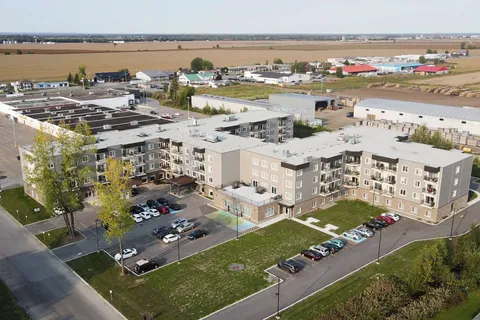 Aerial view of the residence complex and surrounding lawns.