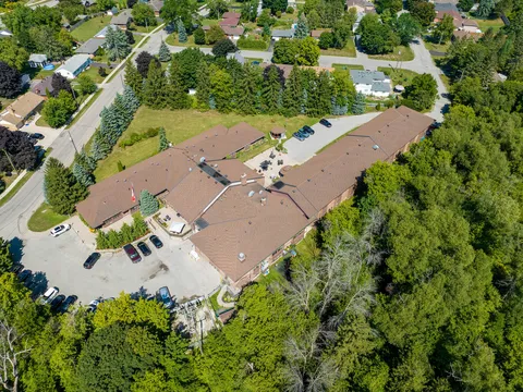 Aerial view of the residence and surrounding trees