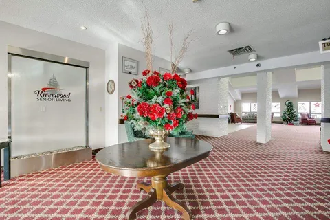 Entrance lobby with flower arrangement and reception counter