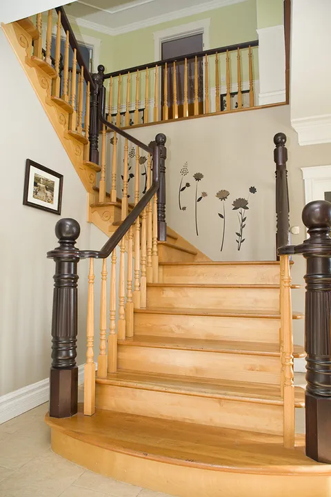 Interior staircase and tiled entrance hall.