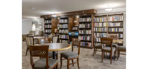 Library with bookshelves and reading tables