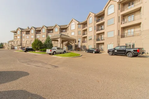 Residence facade with balconies beside the circular driveway.