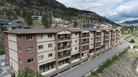 Aerial view of the residence building and surrounding streets.