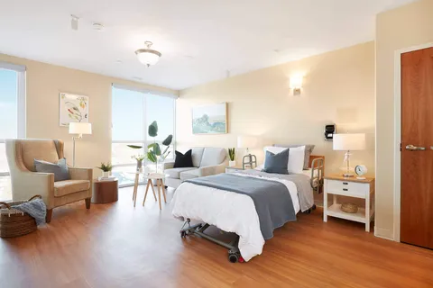 Studio suite with bed and sitting area