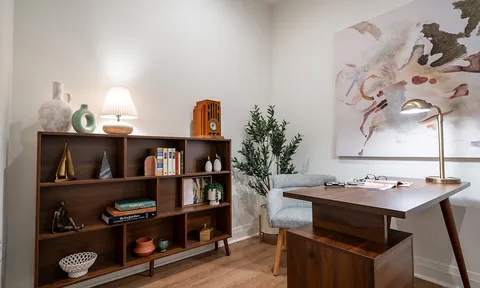 Desk and shelving in a suite study