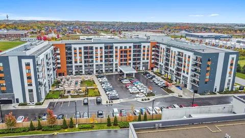 Aerial view of the residence, courtyard and parking area