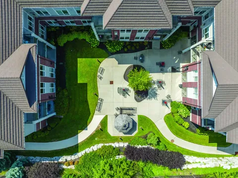 Overhead view of the residence surrounding a courtyard and garden