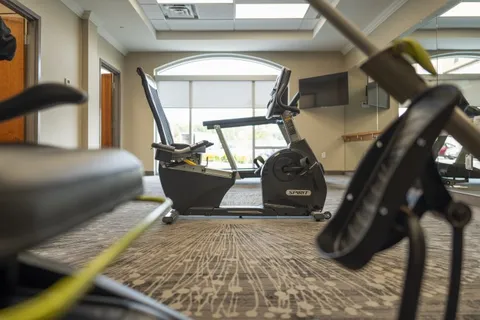 Exercise room with stationary bicycles and fitness equipment