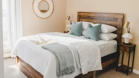 Bedroom with a bed and bedside table.
