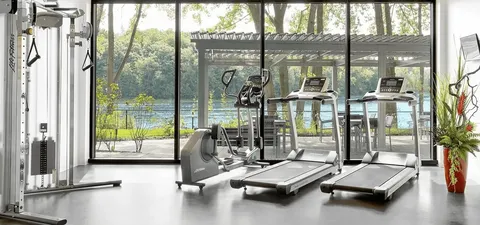 Exercise room with treadmills and weight equipment
