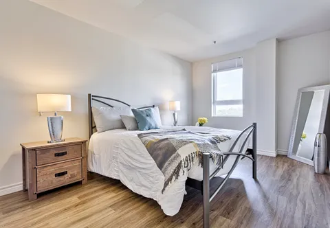 Bedroom with a double bed and wooden bedside tables