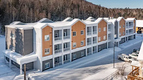 Aerial view of the three-storey residence in winter.
