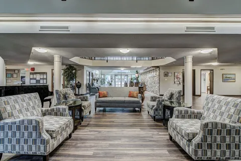 Lounge with sofas beside the lobby.