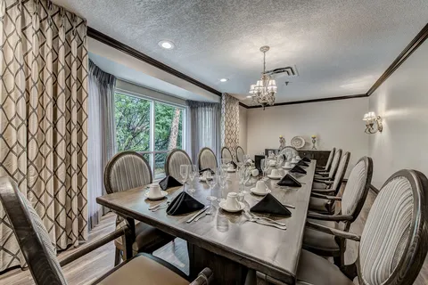 Private dining room with a long table.