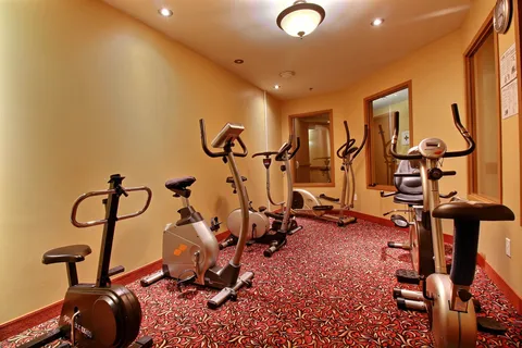 Fitness room with exercise bicycles.