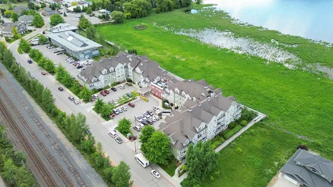 Aerial view of the residence building and its grounds.