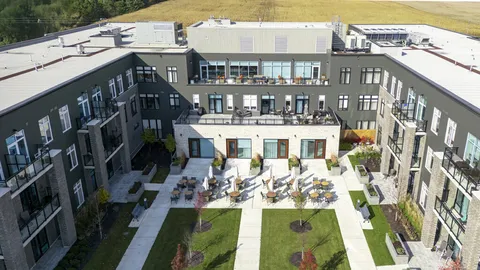 Elevated view of the courtyard and surrounding balconies.
