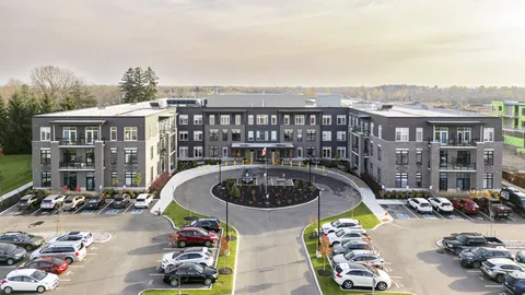 Elevated view of the residence, front entrance and parking area.