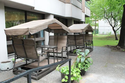 Patio with covered garden swings and outdoor seating