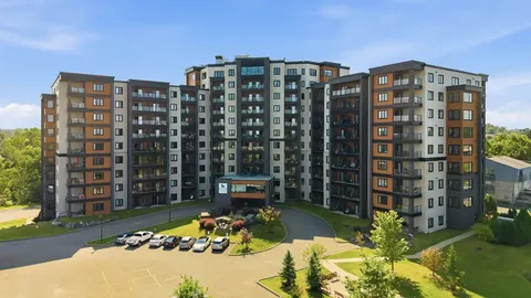 Aerial view of the residence and its entrance driveway