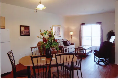 Suite living and dining area with a kitchenette.