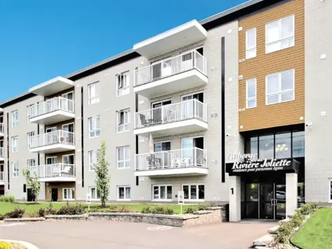 Residence exterior with balconies and entrance.