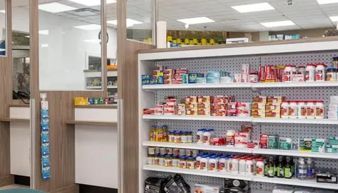 On-site pharmacy shelves and service counter.