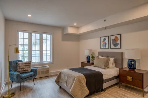 Bedroom with a double bed and bedside furniture