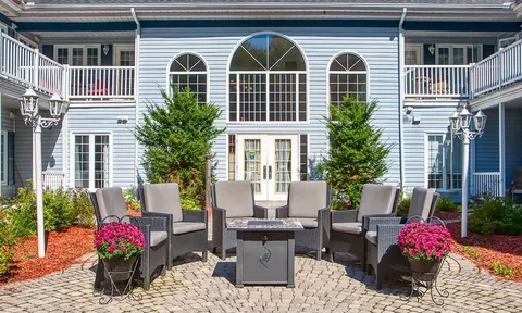 Courtyard seating in front of the residence balconies.