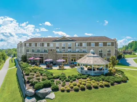 Aerial view of the residence and landscaped grounds