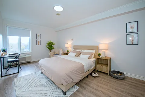 Bedroom with a double bed and bedside furniture