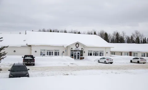 Front exterior of the single-storey residence in winter.