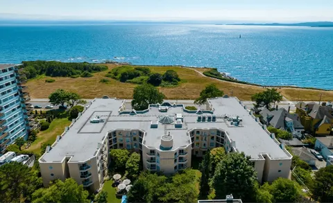 Aerial view of the residence and nearby waterfront park.