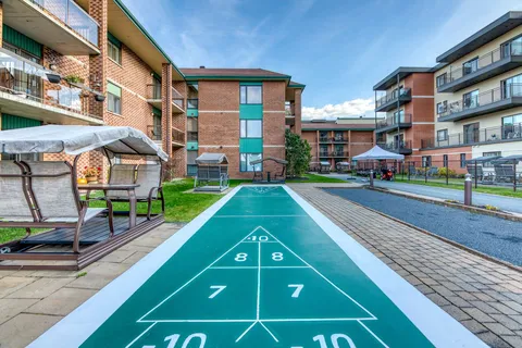 Outdoor shuffleboard lane in the residence courtyard.