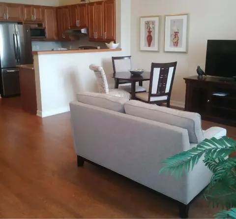 Suite living and dining area with an open kitchen.