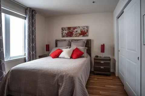 Bedroom with a double bed and bedside tables.