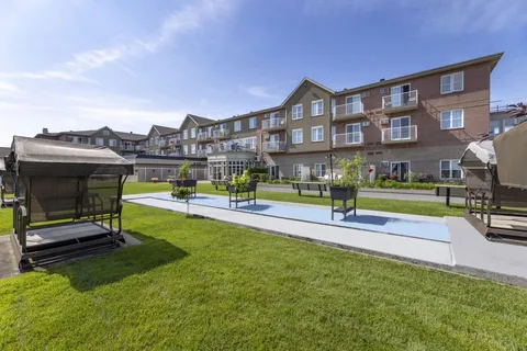 Garden lawn and lawn bowling area beside the residence.
