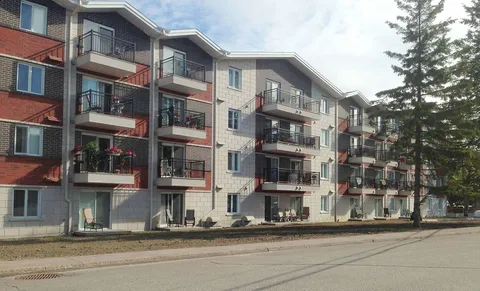 Street-side view of the residence building and balconies.