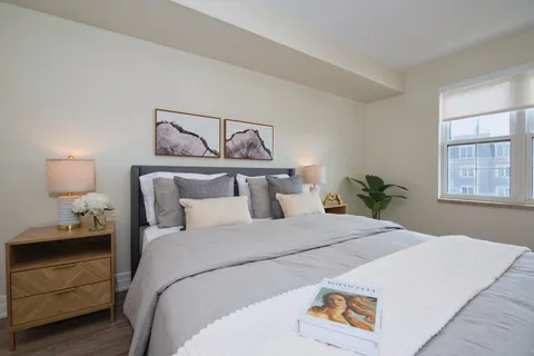 Bedroom with a double bed and wooden bedside tables