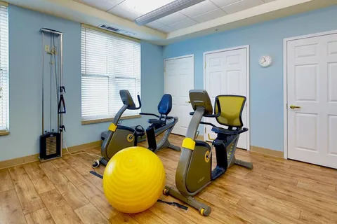 Fitness room with stationary bikes and exercise equipment