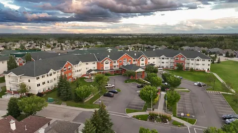 Aerial view of the residence and entrance drive.