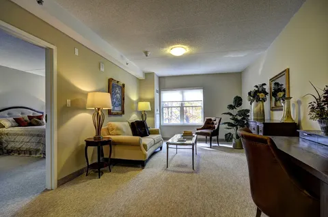 Suite living room with seating and desk