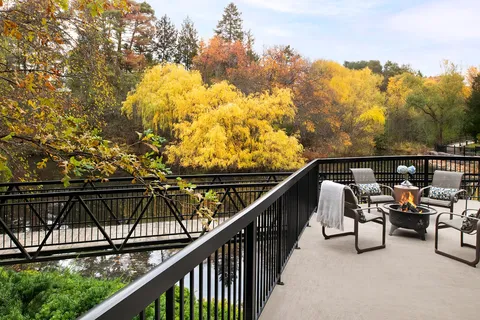 Terrace seating overlooking trees in autumn