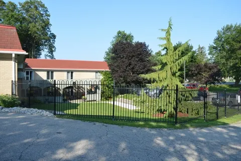 Lawn and garden paths beside the residence